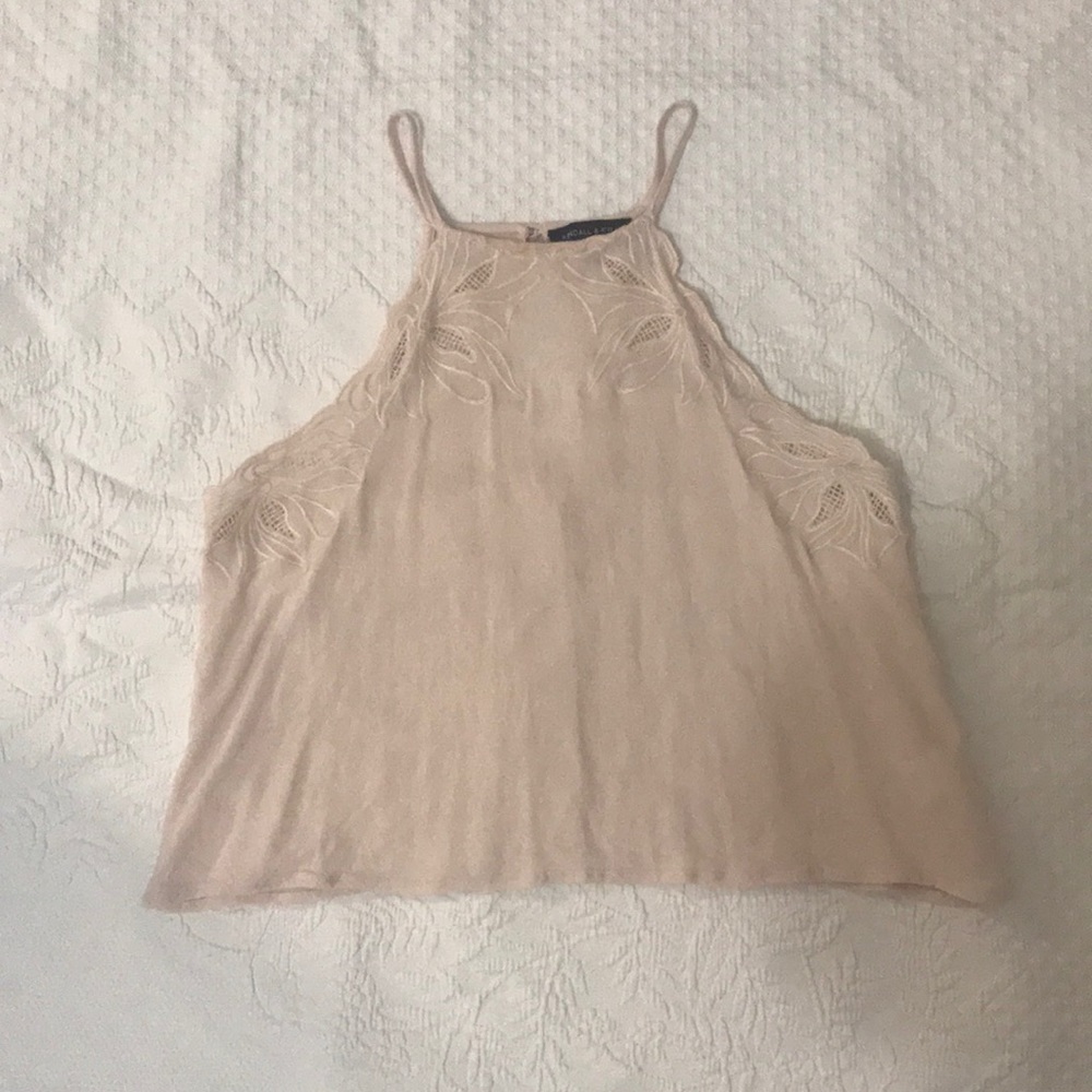 nude crop top